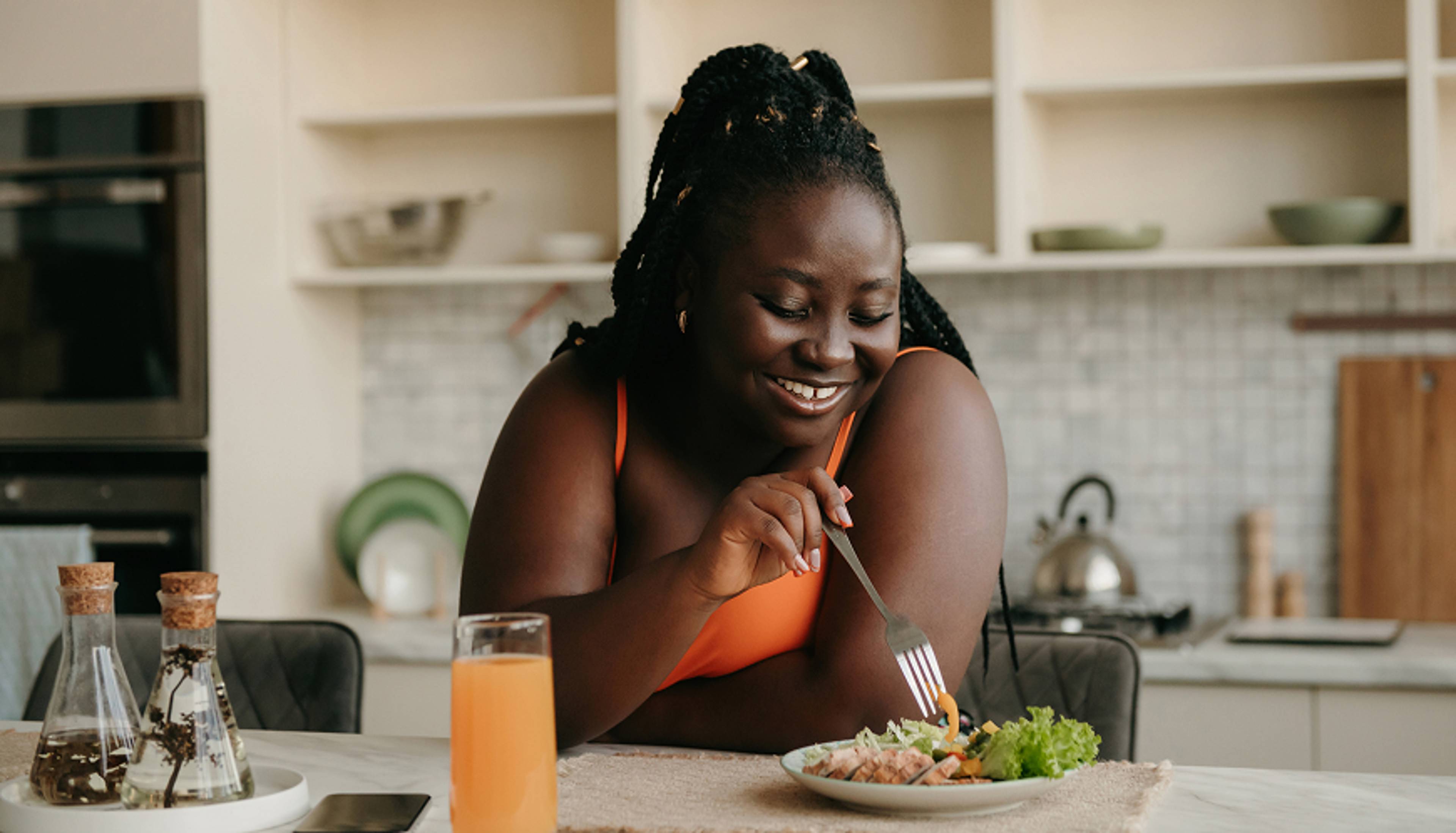 A person using a work eating food.